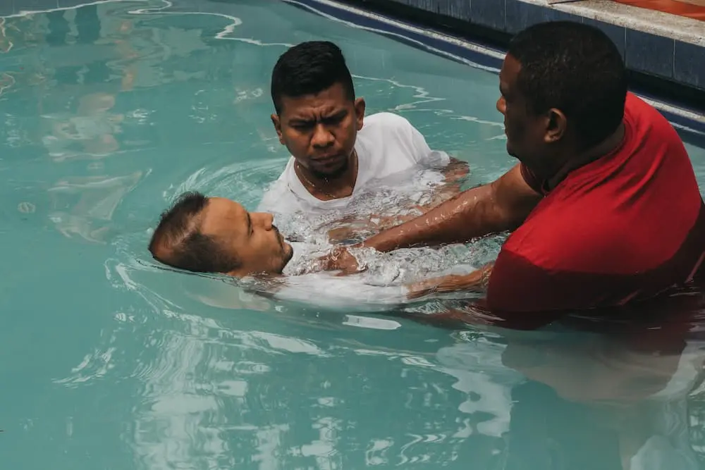 man being baptized