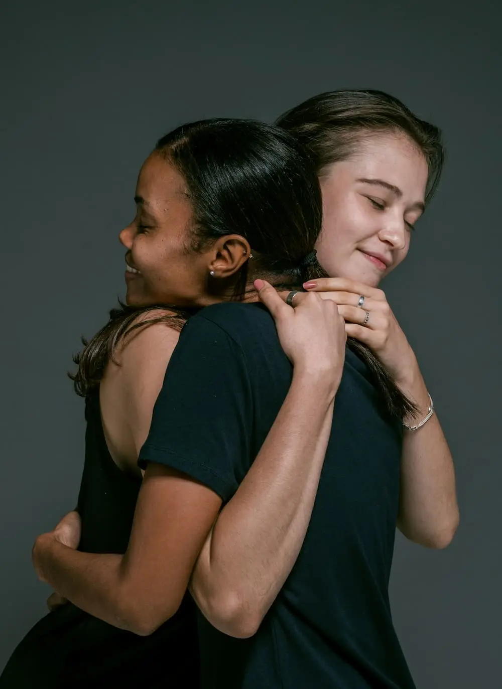 two ladies hug